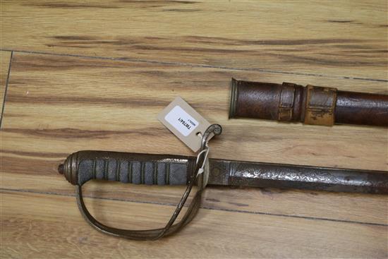 An 1821 pattern WWI George V Royal Artillery officers sword with leather-covered scabbard